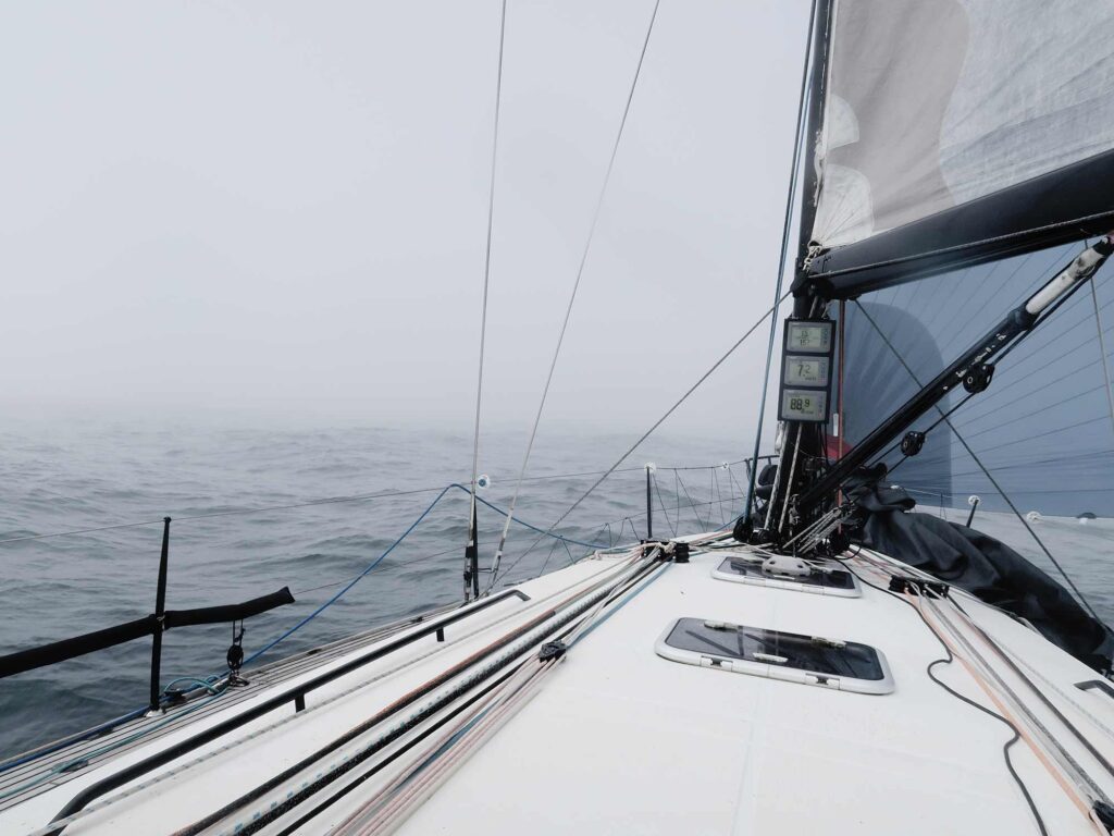sailboat in the fog